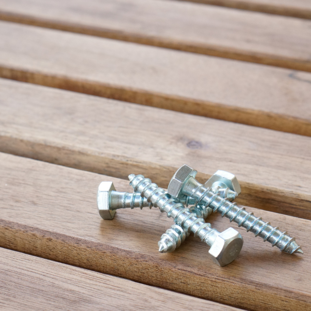 Stainless steel lag bolts on wooden boards