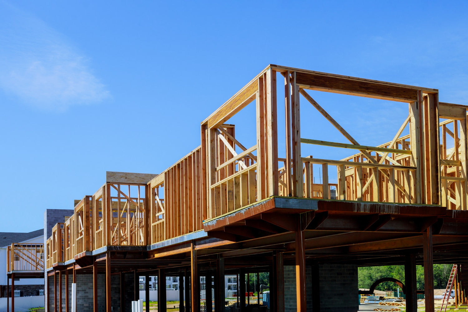 Timber frame house being constructed