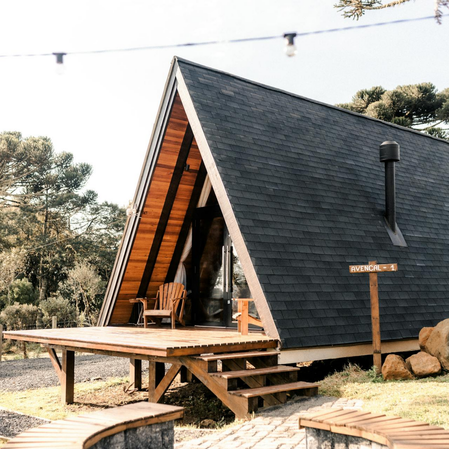 Timber deck attached to A frame house